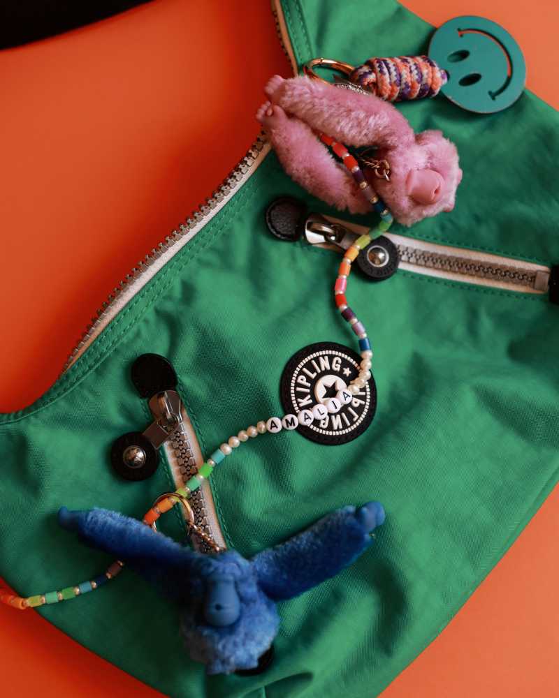 Green Kipling crossbody bag with monkey keychain